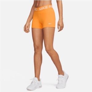 Nike Women's Bright Orange Athletic Shorts